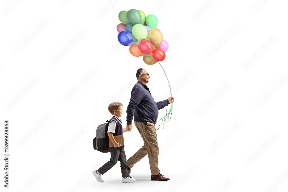 Grandpa and grandson walking with balloons