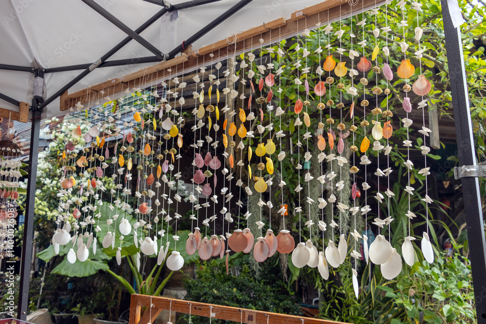 Mollusk shells strung on a string in a souvenir shop