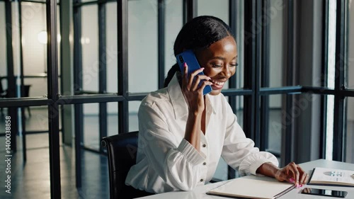 The Smiling Businesswoman on Phone