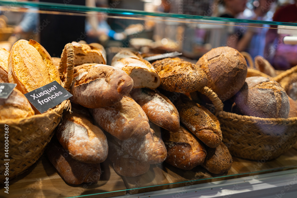 Assorted bread arranged on tray selling at bakery shop. Morning breakfast with fresh breads
