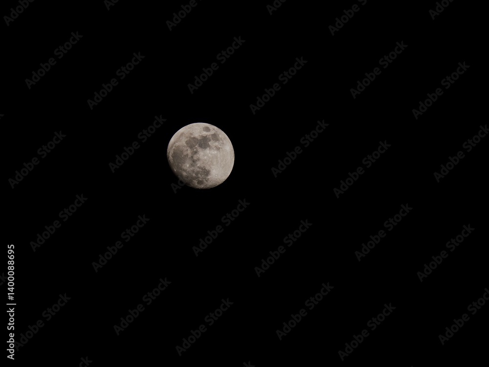 Partial lunar moon showing craters Partial lunar moon showing craters