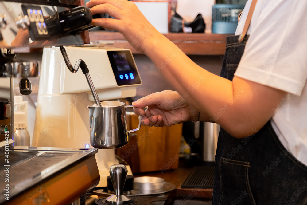 Close-up anonymous barista hands using professional coffee machine making hot espresso and pouring coffee to mug in cozy cafe, small businesses start up for young people lifestyle concept Close-up anonymous barista hands using professional coffee machine making hot espresso and pouring coffee to mug in cozy cafe, small businesses start up for young people lifestyle concept