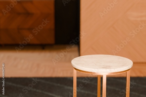 Living room product placement template. Marble on copper side table. Wood panelling.