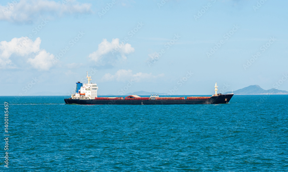 Tranquil Voyage: Cargo Ship at Sea