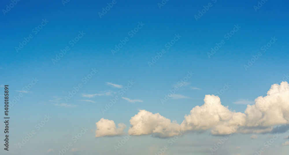 Tranquil Blue Sky with Soft Clouds
