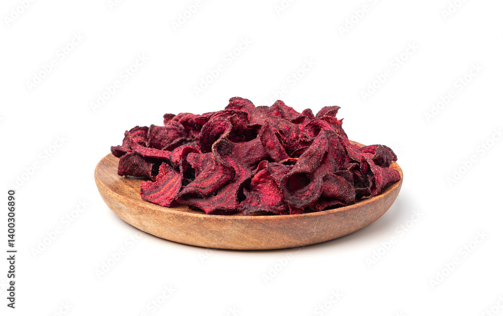 Obraz premium Dry beetroot chips isolated, dried sliced red beet flakes pile, beet root pieces and chips