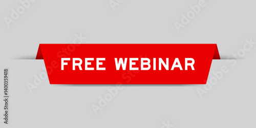 Red color inserted label with word free webinar on gray background