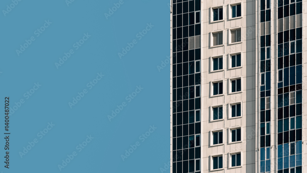 many windows and walls facade of a modern skyscraper without people many windows and walls facade of a modern skyscraper without people