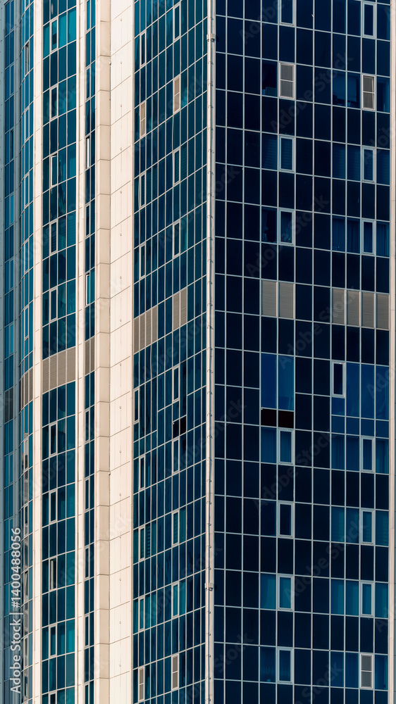 many windows and walls facade of a modern skyscraper without people many windows and walls facade of a modern skyscraper without people