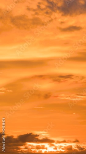 Colorful Morning sunrise sky with Pastel red purple pink n orange yellow cloud or cumulus n cirrocumulus cloudscape in tropical summer or spring sunlight n sun ray on cloudy day, 4k b-roll TimeLapse ,