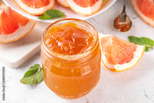 Homemade grapefruit jam in small jar