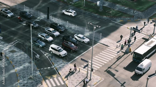 Abu Dhabi,UAE -10 January 2024 : Aerial Top Down View of City Traffic on a Highway. A scene reflecting efficiency and rapid development in the Middle East.