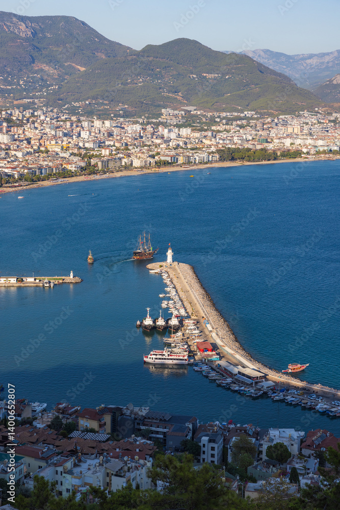 Coastal cityscape with a stunning sea view, featuring Alanya harbor