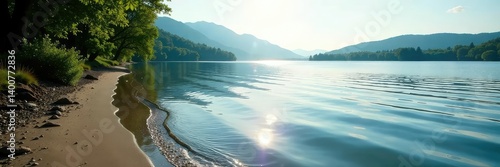 The gentle lapping of water against the shore of a serene lake, serenity, nature sounds, tranquility