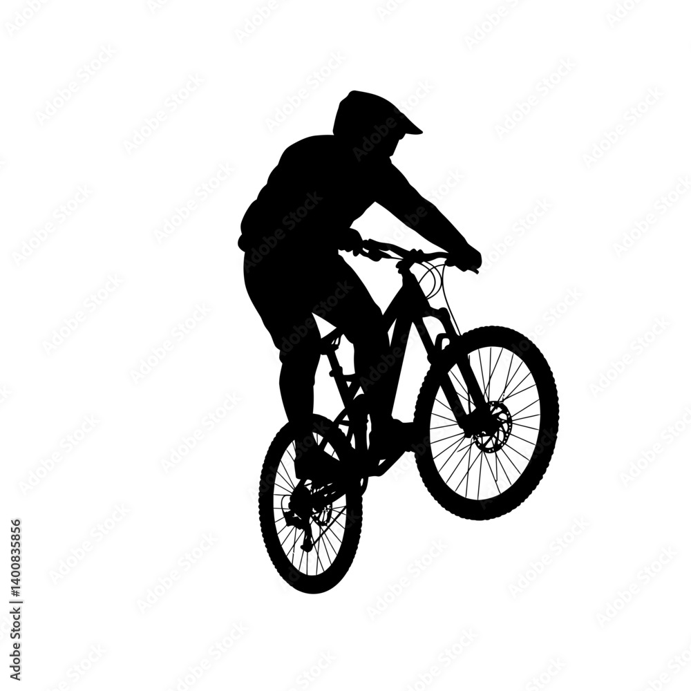 Naklejka premium Mountain biker jumps skillfully on a trail doing stunts in silhouette style
