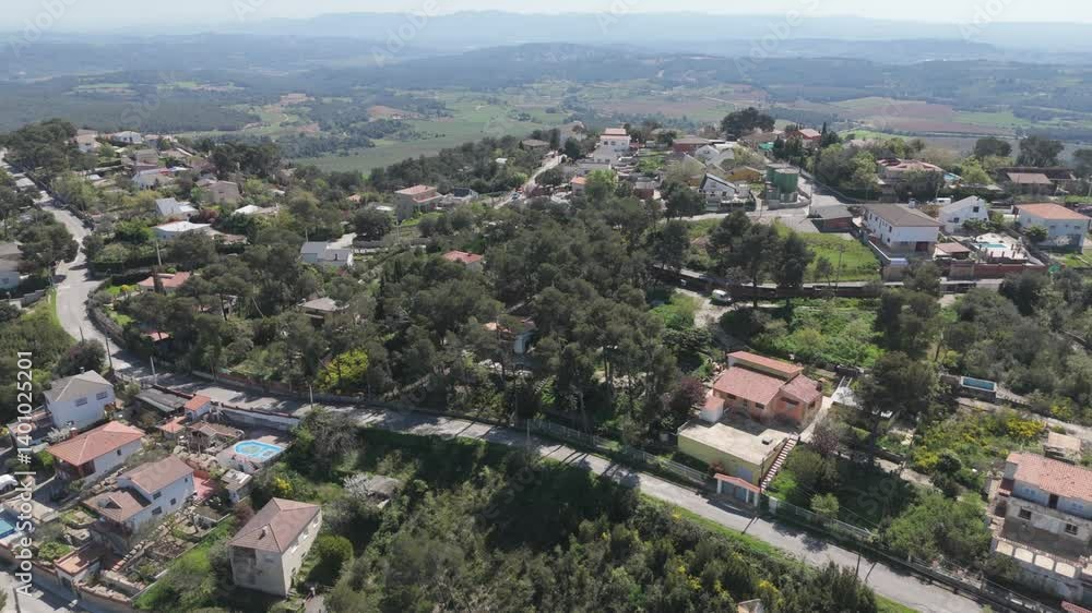 sidential homes nestled among trees in this aerial view. Suburban living with a touch of nature's serenity. sidential homes nestled among trees in this aerial view. Suburban living with a touch of nature's serenity.
