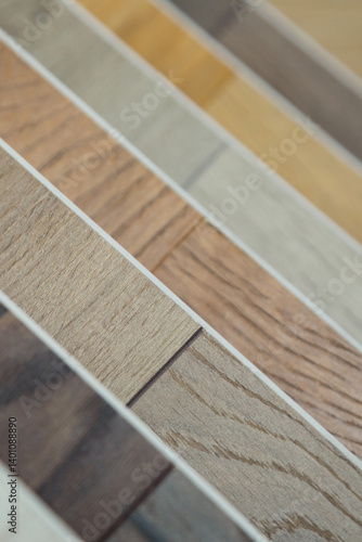 Samples of laminate or vinyl flooring in different wood textures