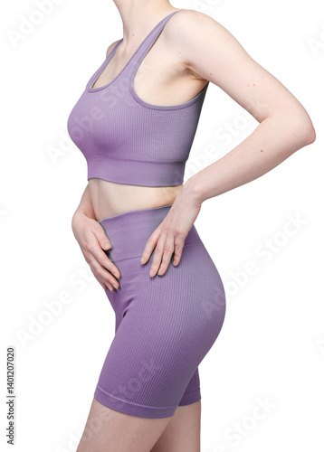 Obraz na płótnie Detailed view of grey ribbed high-waisted shorts on a woman's lower body. The ribbed knit texture and high-waisted design are clearly visible. Studio lighting, white background. w salonie