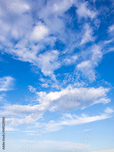 Photography The sky is blue and clear with a few clouds scattered throughout