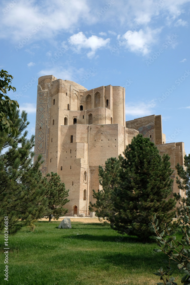 ruined arch of Ak-Saray palace and green trees in foreground, Shakhrisabz, Uzbekistan ruined arch of Ak-Saray palace and green trees in foreground, Shakhrisabz, Uzbekistan