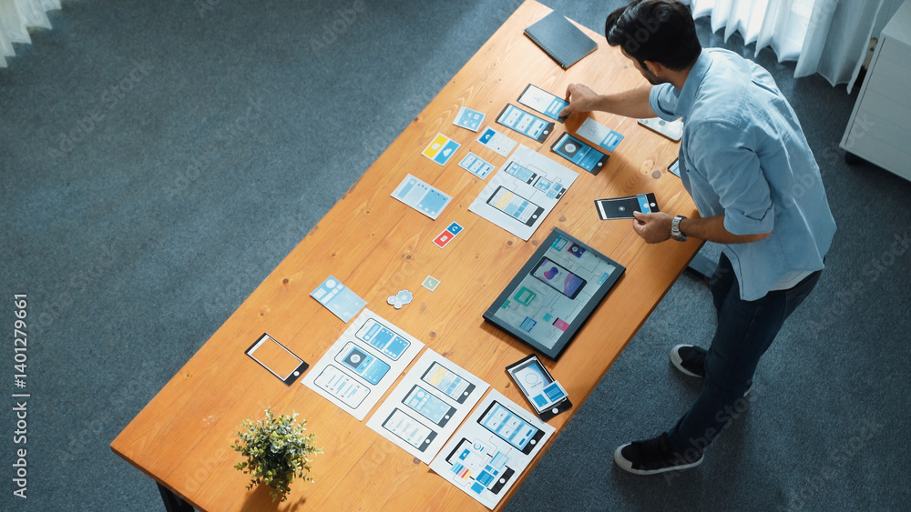 Top down view of male leader using phone to call manager while walking at meeting table. Professional businessman talking or discussing with smart manager about business plan or strategy. Convocation.