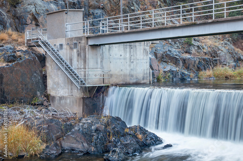diversion dam on Big Thompson RIver in Rocky Mountains near Loveland, Colorado photo