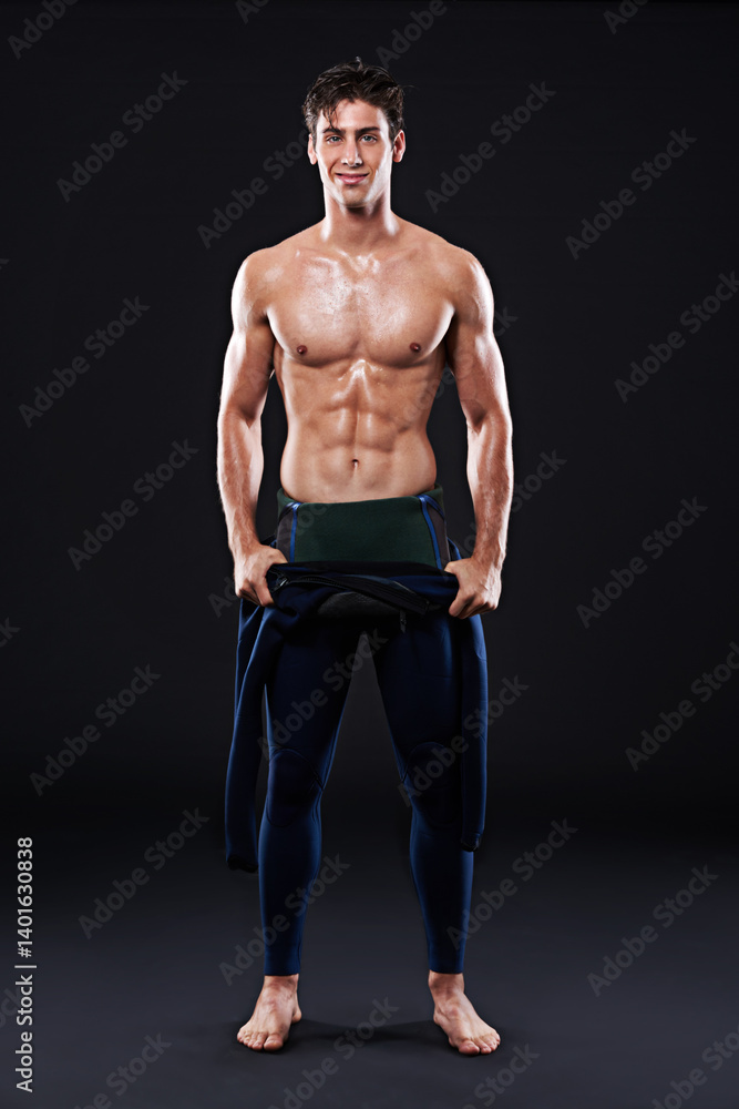 Fototapeta premium Studio, portrait of surfer or smile for sports, fitness and training for competition event. Professional athlete, male person or model and man with mockup, muscle or abs on dark background with pride