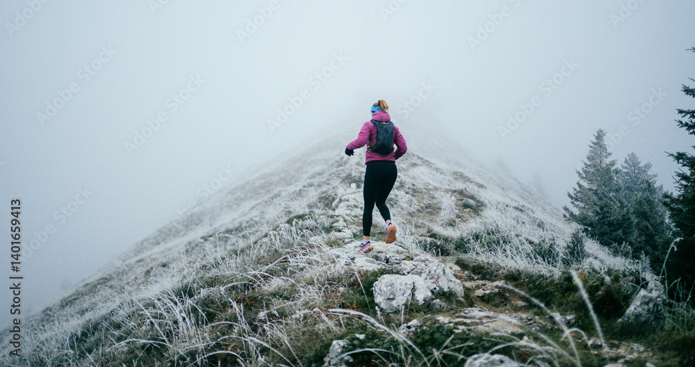 Trail Runner in Misty Mountain Landscape