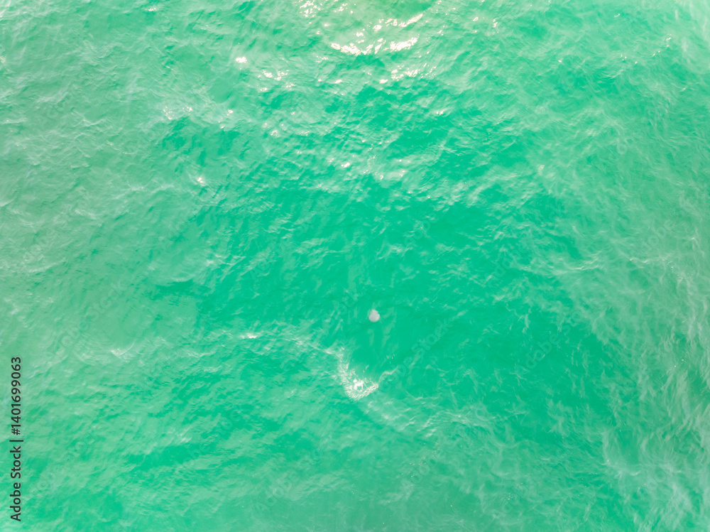 Naklejka premium Sea surface aerial view,Bird eye view photo of waves water surface texture,Summer sea background,Beautiful nature Amazing view sea background
