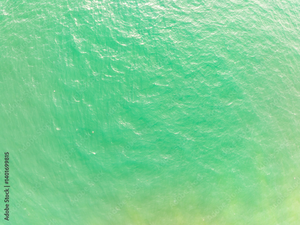 Obraz premium Sea surface aerial view,Bird eye view photo of waves water surface texture,Summer sea background,Beautiful nature Amazing view sea background