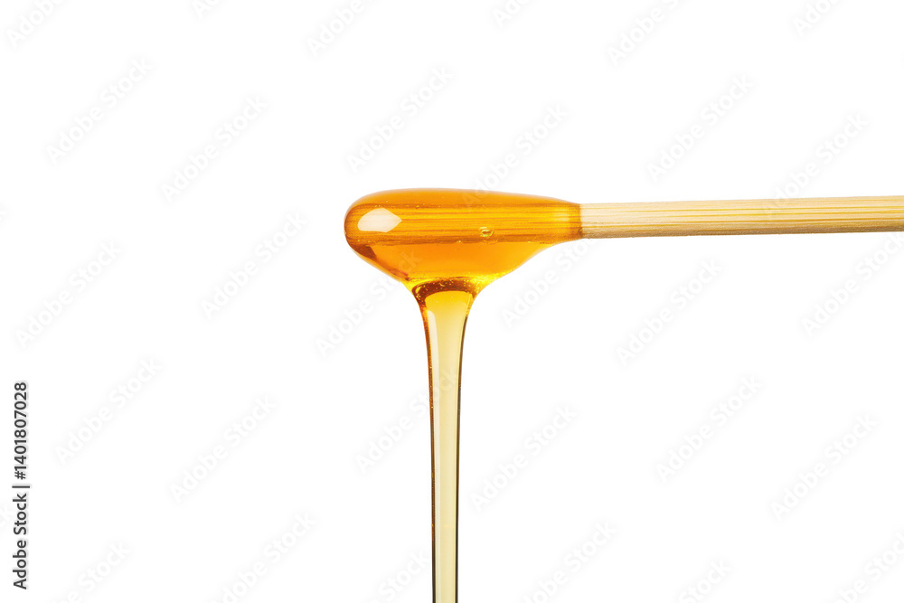 Golden honey dripping from a wooden dipper on a dark background Golden honey dripping from a wooden dipper on a dark background