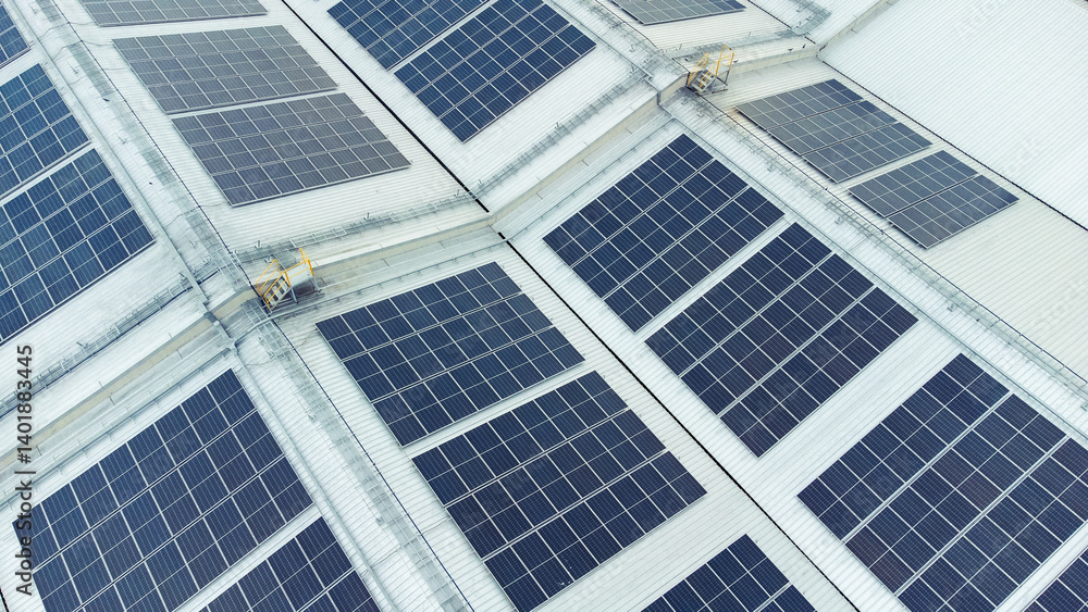 multiple solar panels installed on the rooftop of a building. The solar panels are arranged in neat rows and columns, with clear separations between each panel. multiple solar panels installed on the rooftop of a building. The solar panels are arranged in neat rows and columns, with clear separations between each panel.