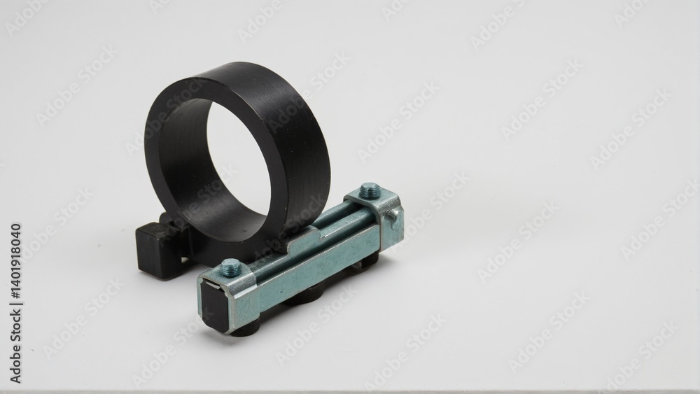 Obraz premium A Study of Mechanics: Exploring Interconnected Components Through Contrasting Materials and a Plain White Backdrop Showcasing the Beauty of Simplicity