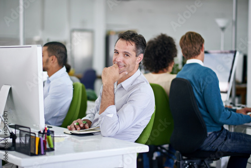 Obraz na płótnie Businessman, office and portrait with smile at desk with notebook for confidence with technology. Employee, team and financial management services for clients in company with tax preparation. w salonie