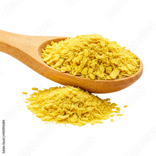 Nutritional yeast pile (deactivated yeast) in wooden spoon isolated on white, side view
