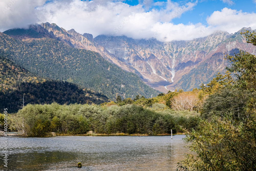 captures the breathtaking beauty of Kamikochi, a mountainous highland valley in the Northern Japan Alps.