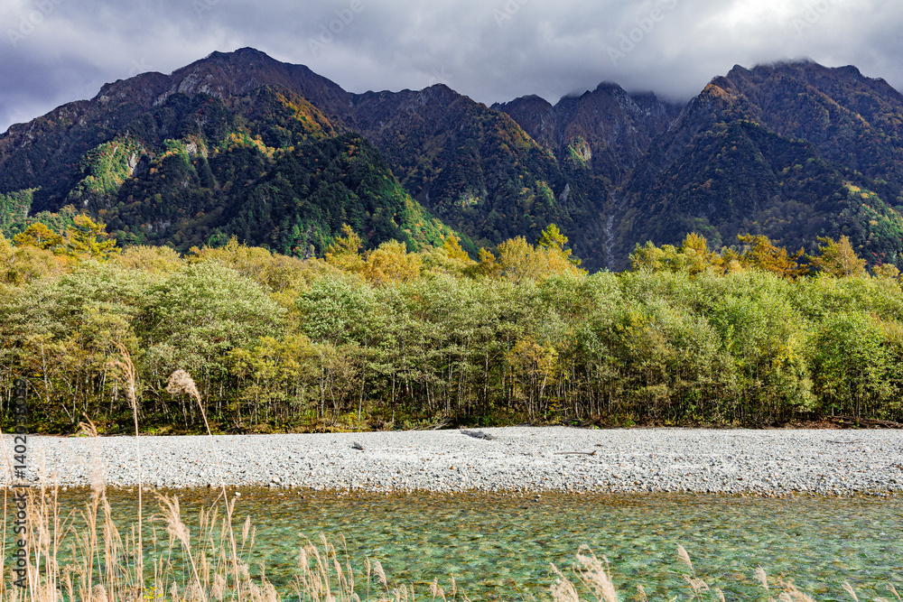 captures the breathtaking beauty of Kamikochi, a mountainous highland valley in the Northern Japan Alps.
