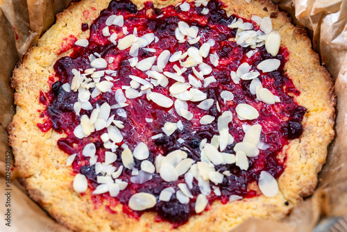 making fruit and chocolate pie on shortcrust pastry