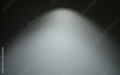 Cement texture background, light shines from above in the center (center focus)