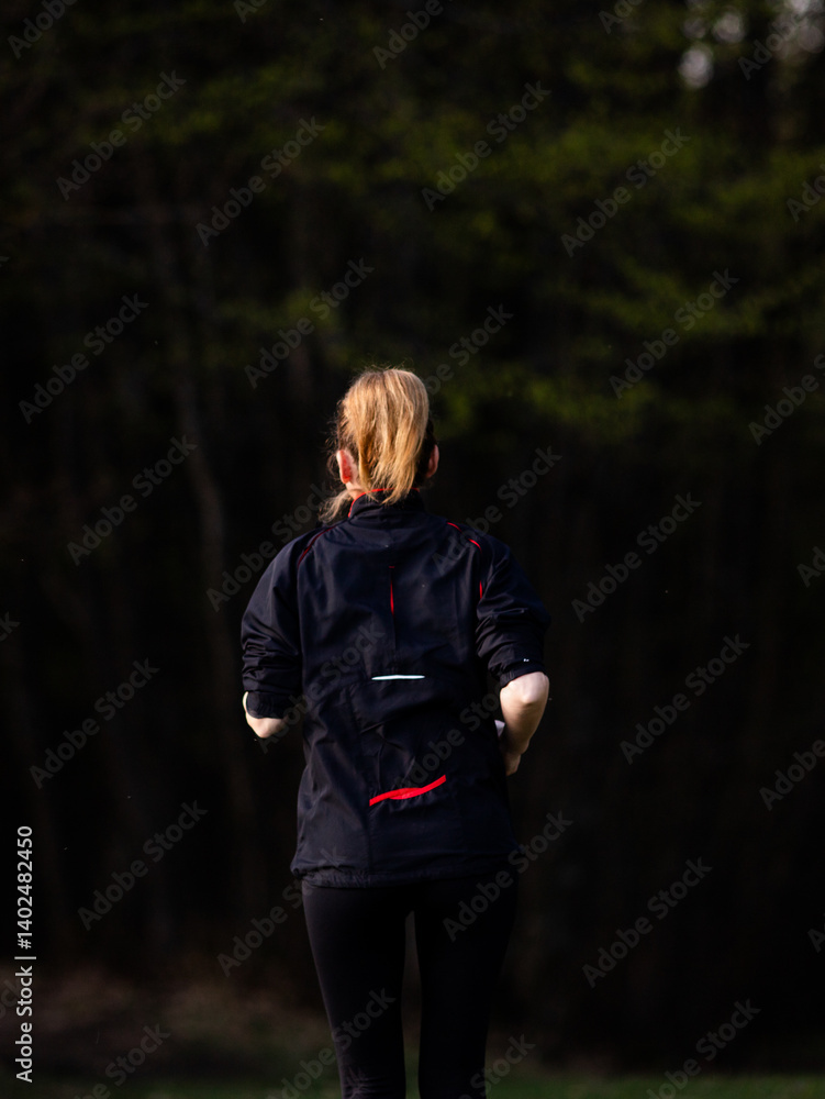 healthy fit woman in her forties running outdoors