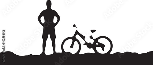 silhouette of a man with a bicycle