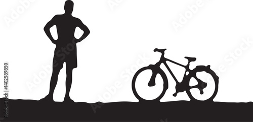silhouette of a man with a bicycle