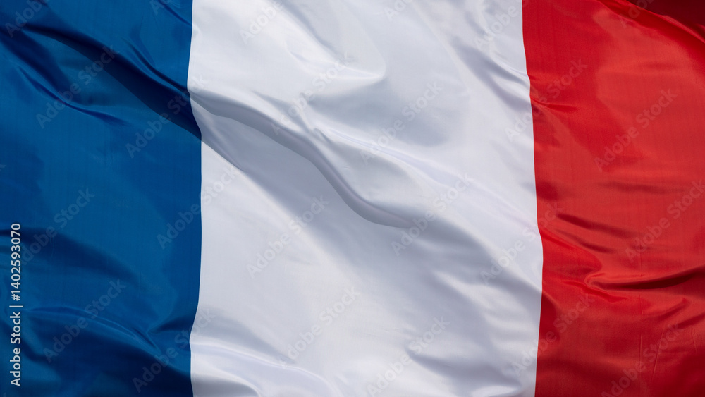 French flag fluttering in the wind, showing the characteristic blue, white and red stripes French flag fluttering in the wind, showing the characteristic blue, white and red stripes