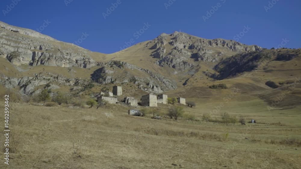 The Old Towers Complex, the largest medieval castle-type tower villages, is located on the edge of a mountain range in Ingushetia, Russia. An ancient family crypt. The Old Towers Complex, the largest medieval castle-type tower villages, is located on the edge of a mountain range in Ingushetia, Russia. An ancient family crypt.