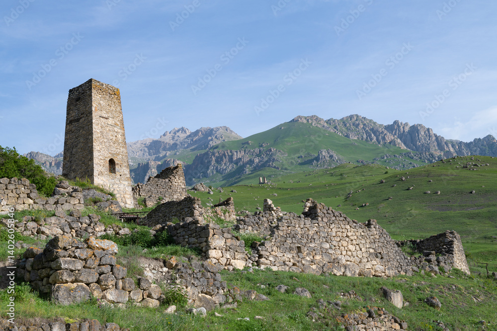 Morning mountain landscape with an ancient Ossetian tower. Tsmiti, North Ossetia - Alania. Russian Federation