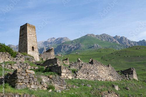 Obraz na płótnie Morning mountain landscape with an ancient Ossetian tower. Tsmiti, North Ossetia - Alania. Russian Federation w salonie