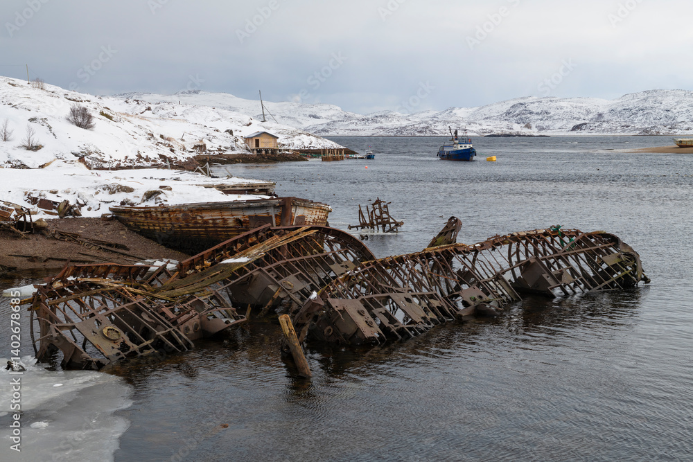 A cloudy March day at the cemetery of old ships. Teriberka, Murmansk region. Russia