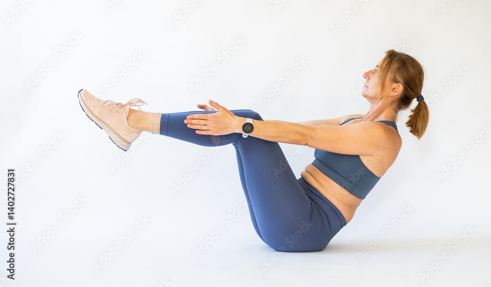 fit woman doing yoga or pilates