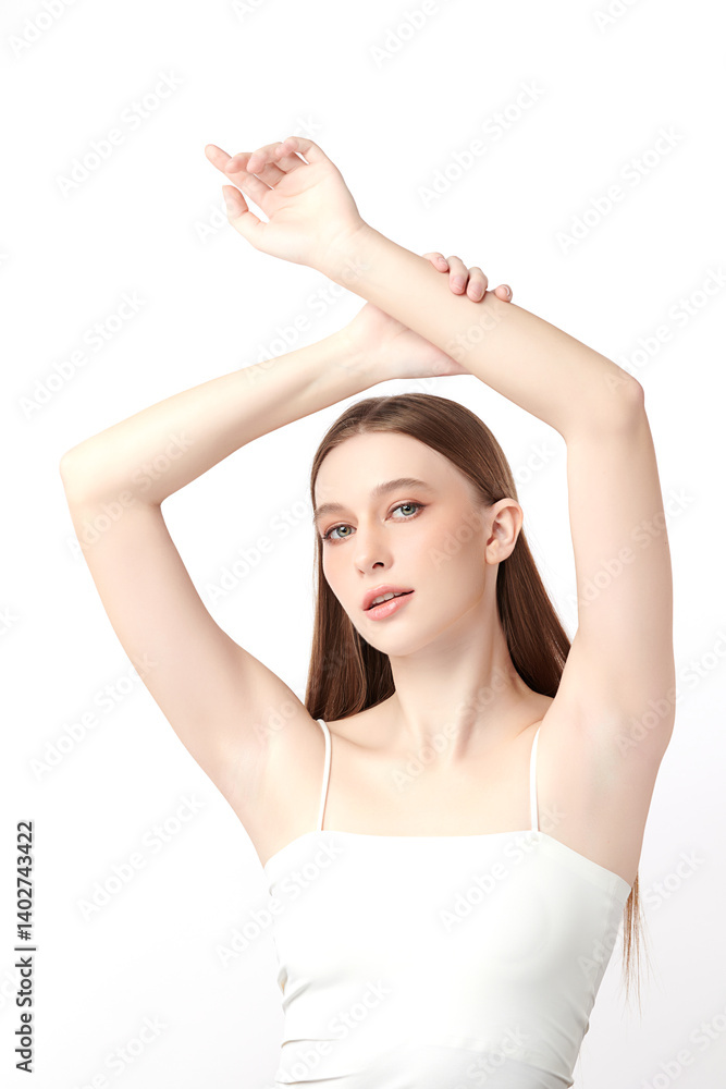 Beautiful Young woman Raises her hands to Showcase clean and hygienic underarms Against a white background, Smooth armpit cleanliness and protection concept Beautiful Young woman Raises her hands to Showcase clean and hygienic underarms Against a white background, Smooth armpit cleanliness and protection concept