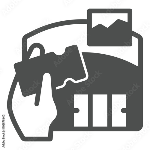 Exhibition center and hand with ticket solid icon, exhibition concept. Vector graphics. Building with presentation hall, hangar sign on white background, glyph style icon for mobile or web design.